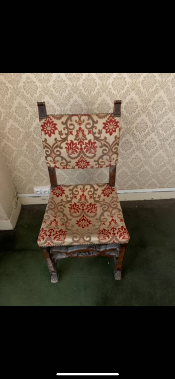 Antique wooden chair with upholstery