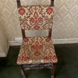 Antique wooden chair with upholstery