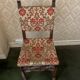 Antique wooden chair with upholstery