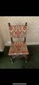 Antique wooden chair with upholstery