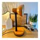 Orange articulated desk lamp