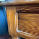Small solid wood desk with a drawer.