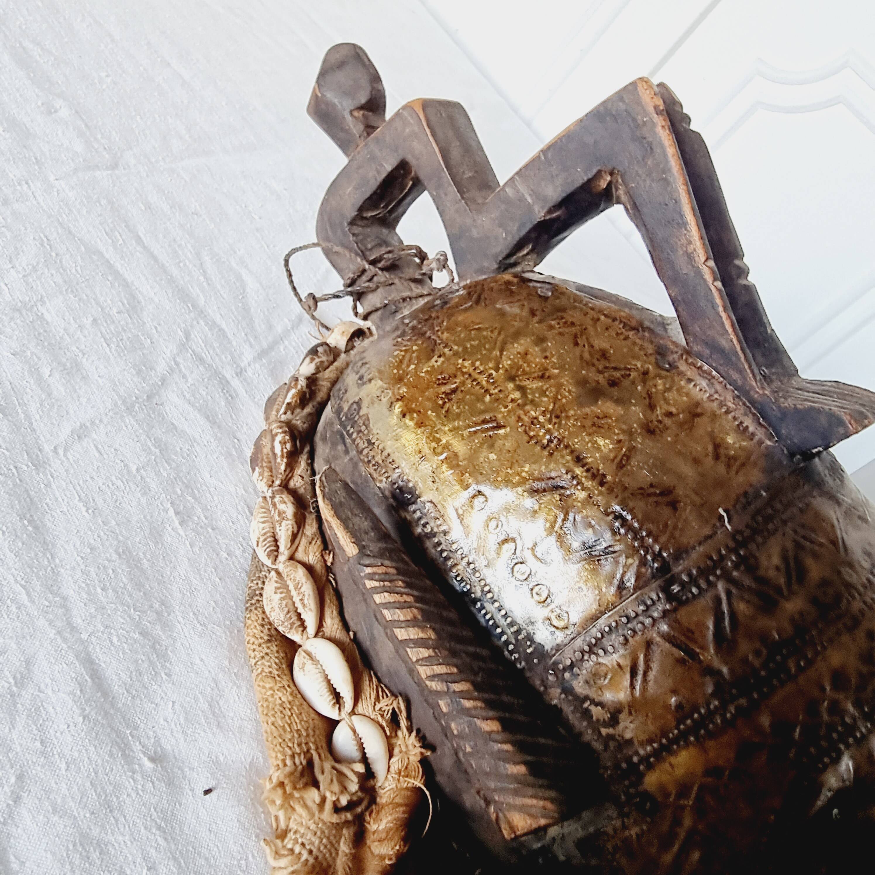 African mask from Mali from the N'Tomo tribe of Marka covered in chiseled brass