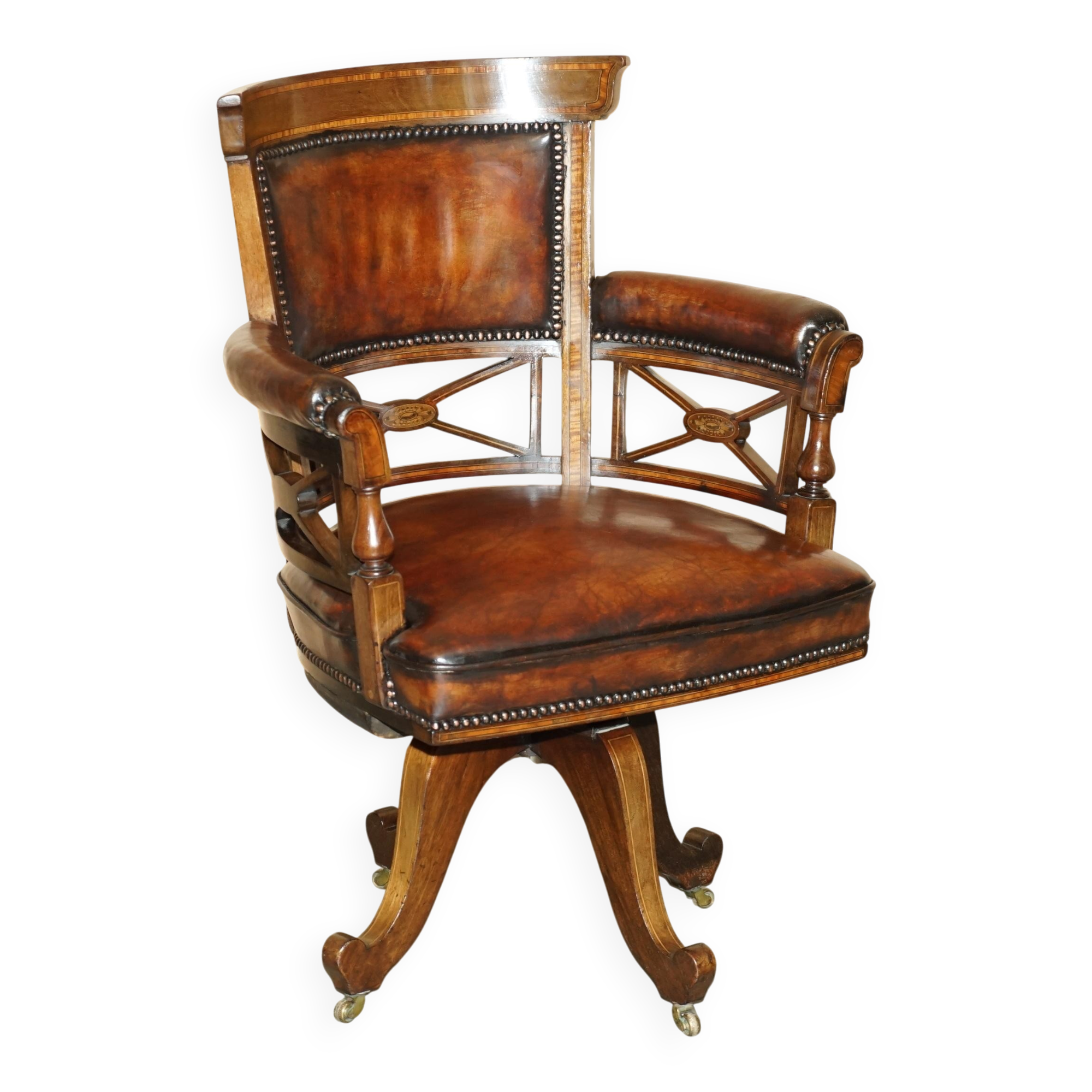 Victorian captain's chair in leather restored by Cornelius V Smith.