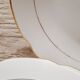 Lot 2 plats porcelaine blanc et or