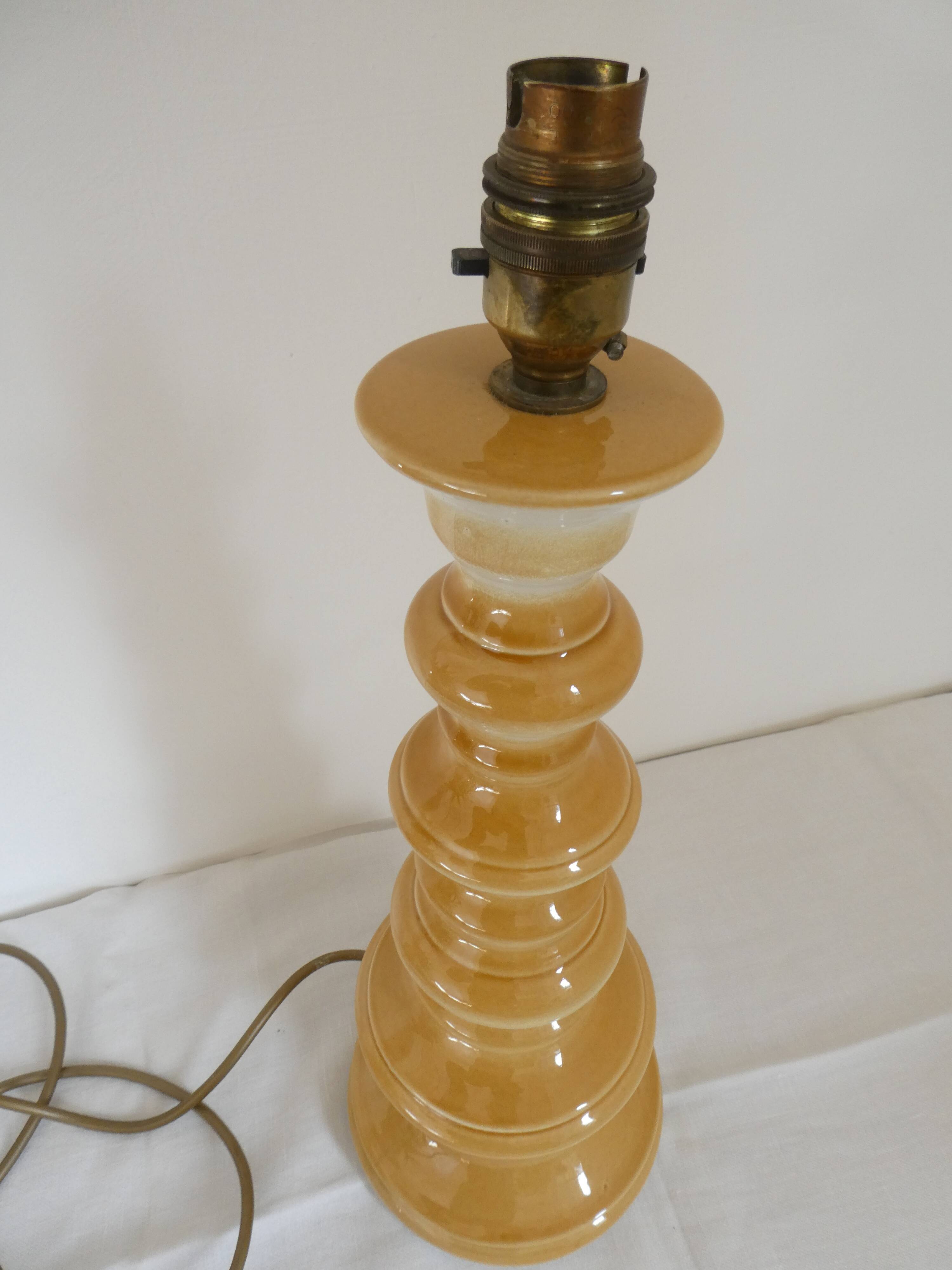 Large baluster-shaped lamp base in yellow and beige ceramic from the 1960s.