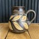 Vase ou pichet d'Alexandre Kostanda motif feuillages