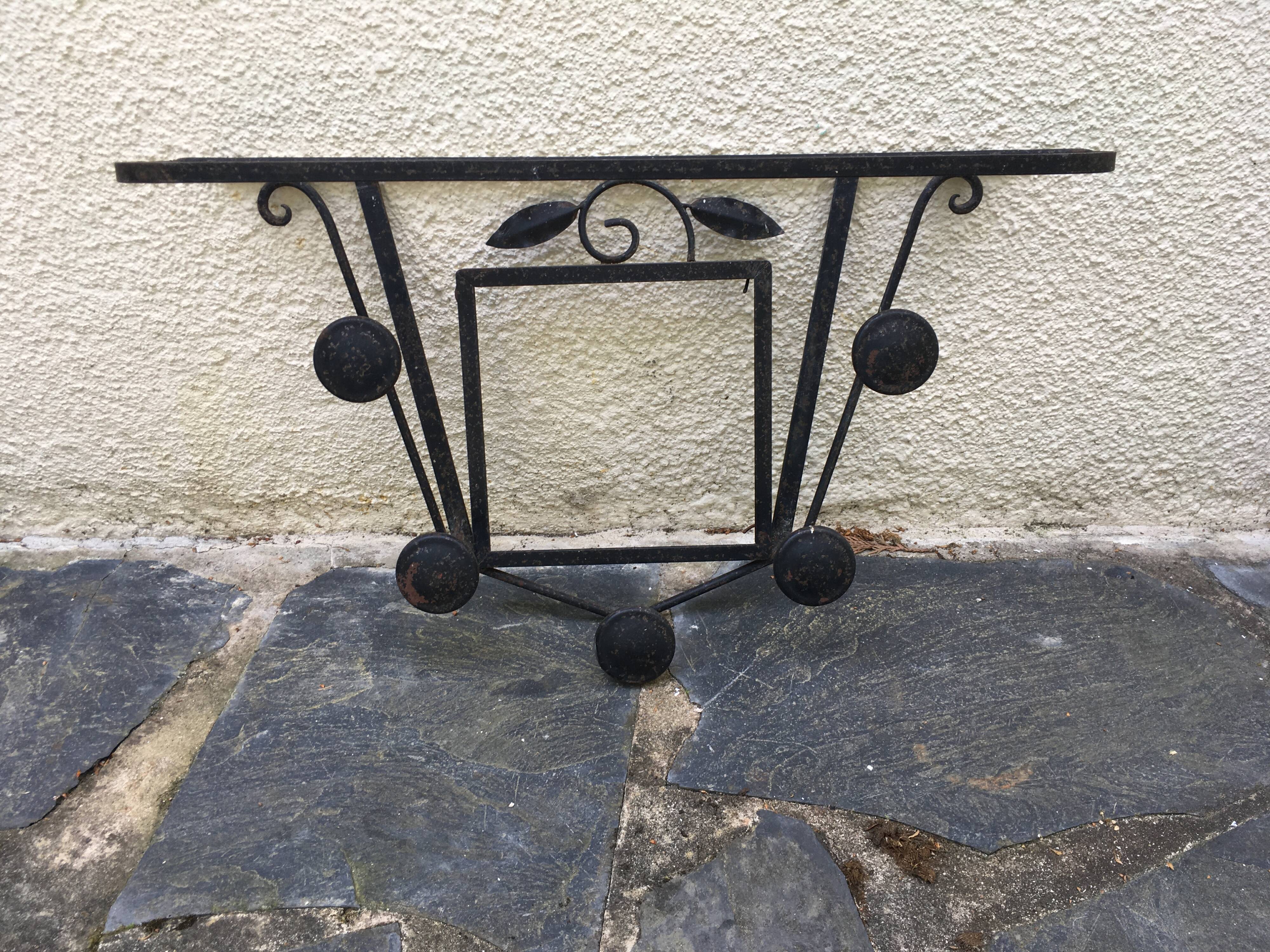 Wrought iron coat rack.