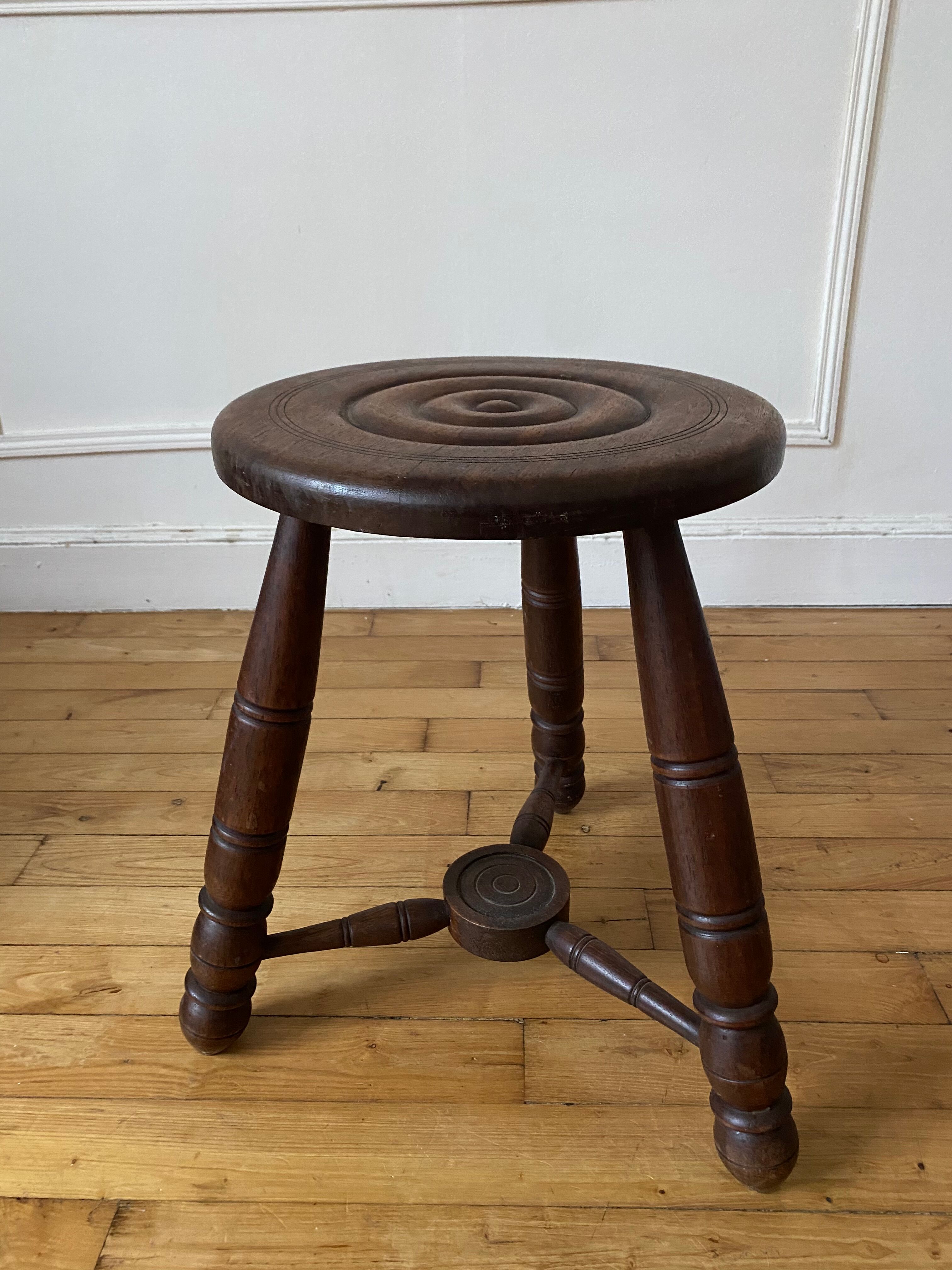 Wooden tripod stool