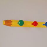 Pencil wall coat rack