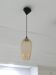 Amber glass suspension light, warm modern interior lighting.