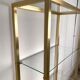 Bookcase in gilded metal and glass, Pierre Vandel Paris, circa 70