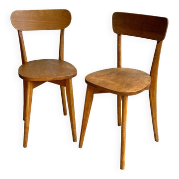Pair of raw wood chairs
