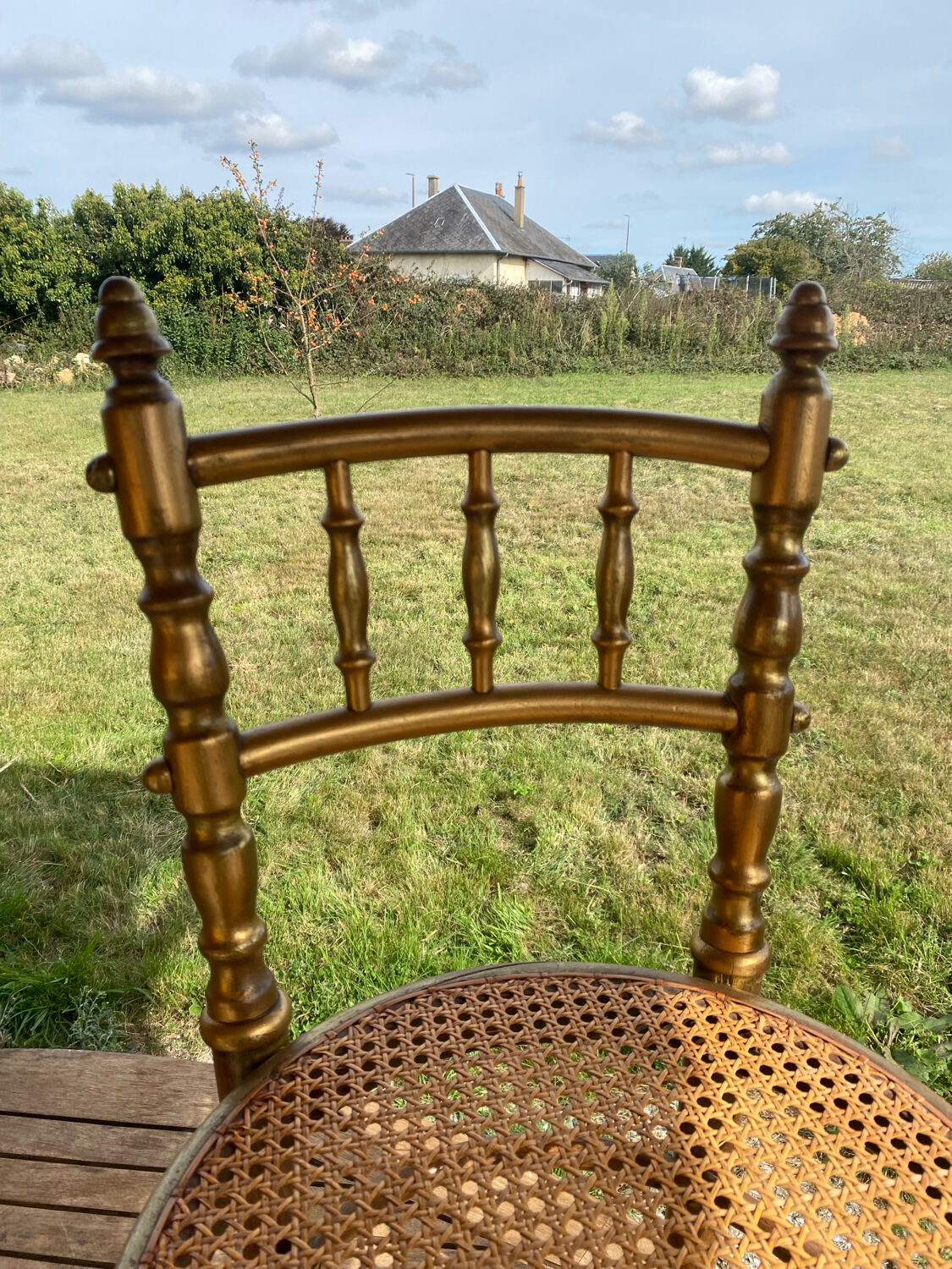 Children's chair in cane and curved wood