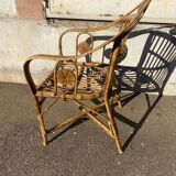 Wicker armchair with medallions