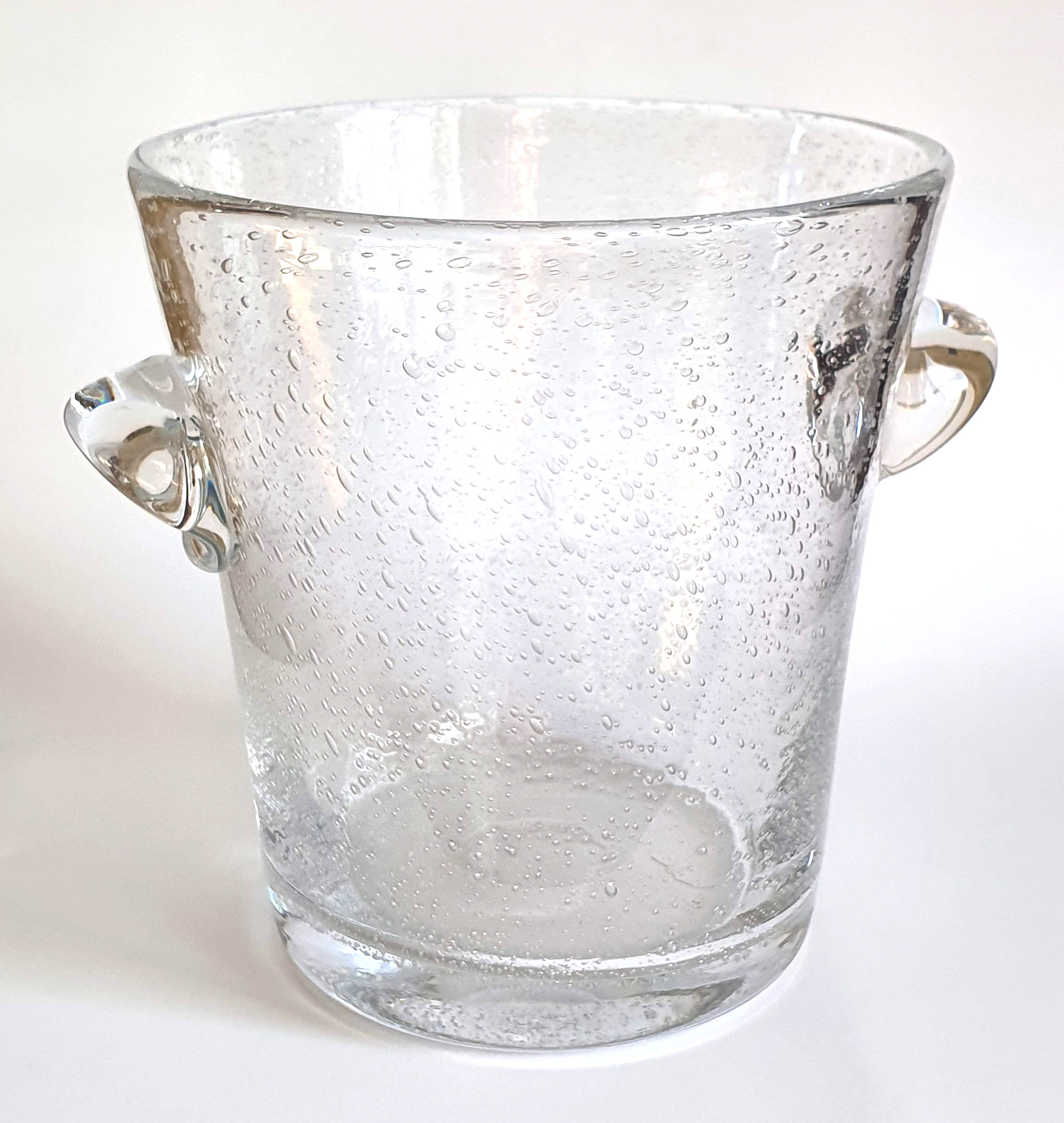 Champagne bucket in glass of biot