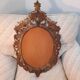 Italian mirror in gilded scupted wood