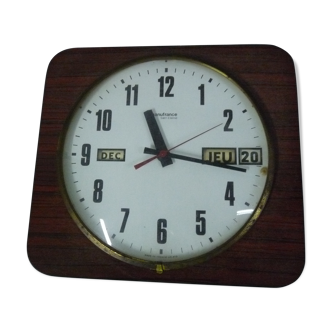 Brown formica wall clock