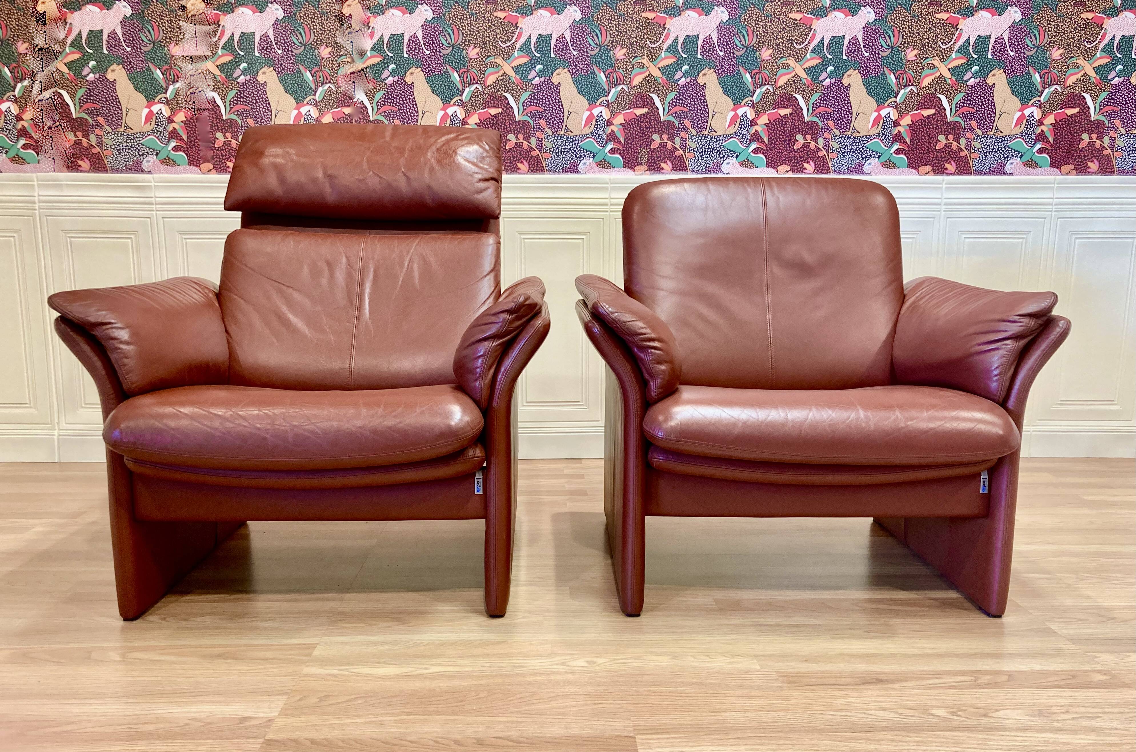 Pair of "Erpo" designer adjustable leather armchairs.