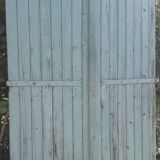 Pair of large wooden iron hanging shutters