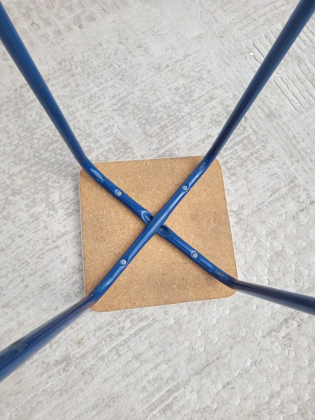 Vintage 80s melamine stool in navy blue checkered pattern.