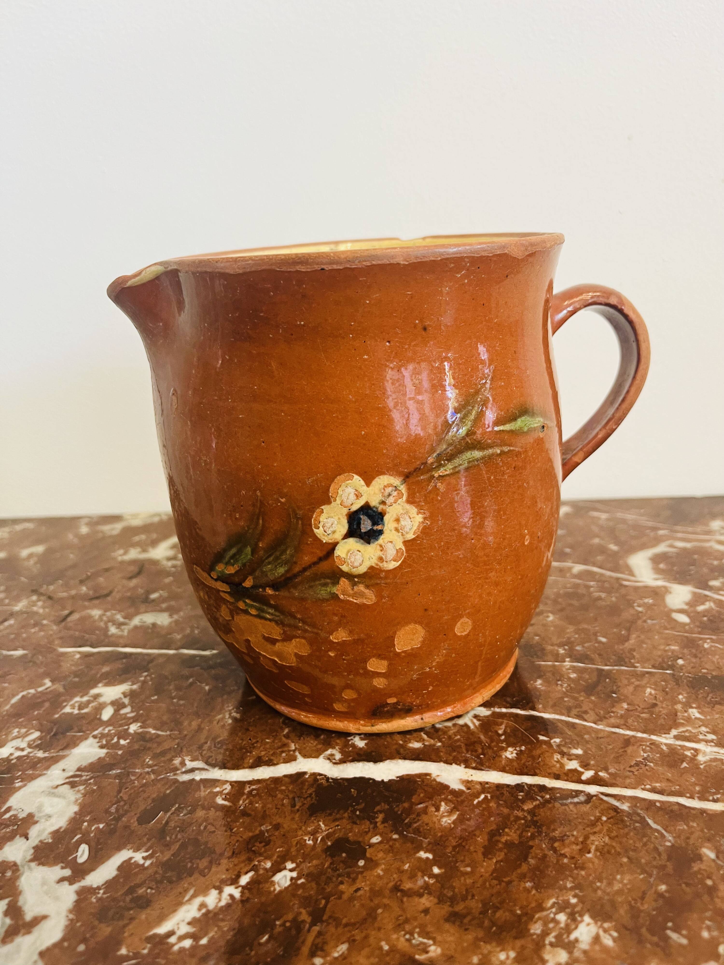 Ancienne poterie pichet savoyard à décor floral