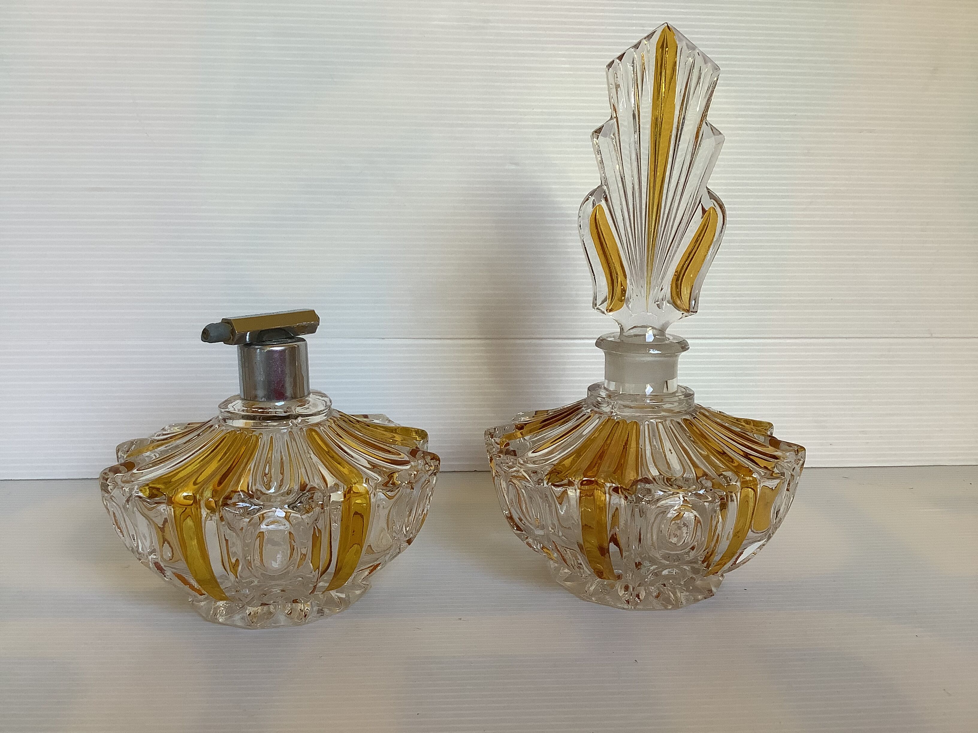 Perfume bottles and art deco spray