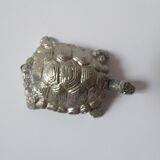 Small box in the shape of a silver metal turtle