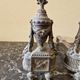 Pair of bronze andirons in Louis XVI style, late 19th century.