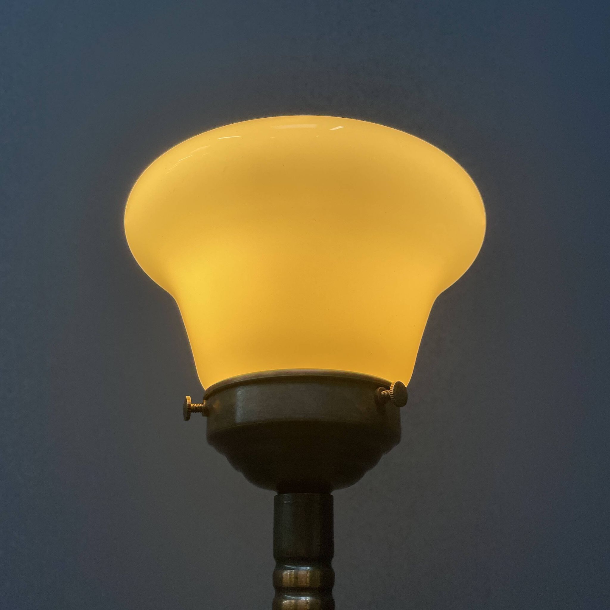 Standing copper table lamp with glass shade