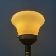 Standing copper table lamp with glass shade
