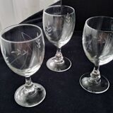 6 vintage wine glasses with baluster stems and engraved decoration on the bowl.