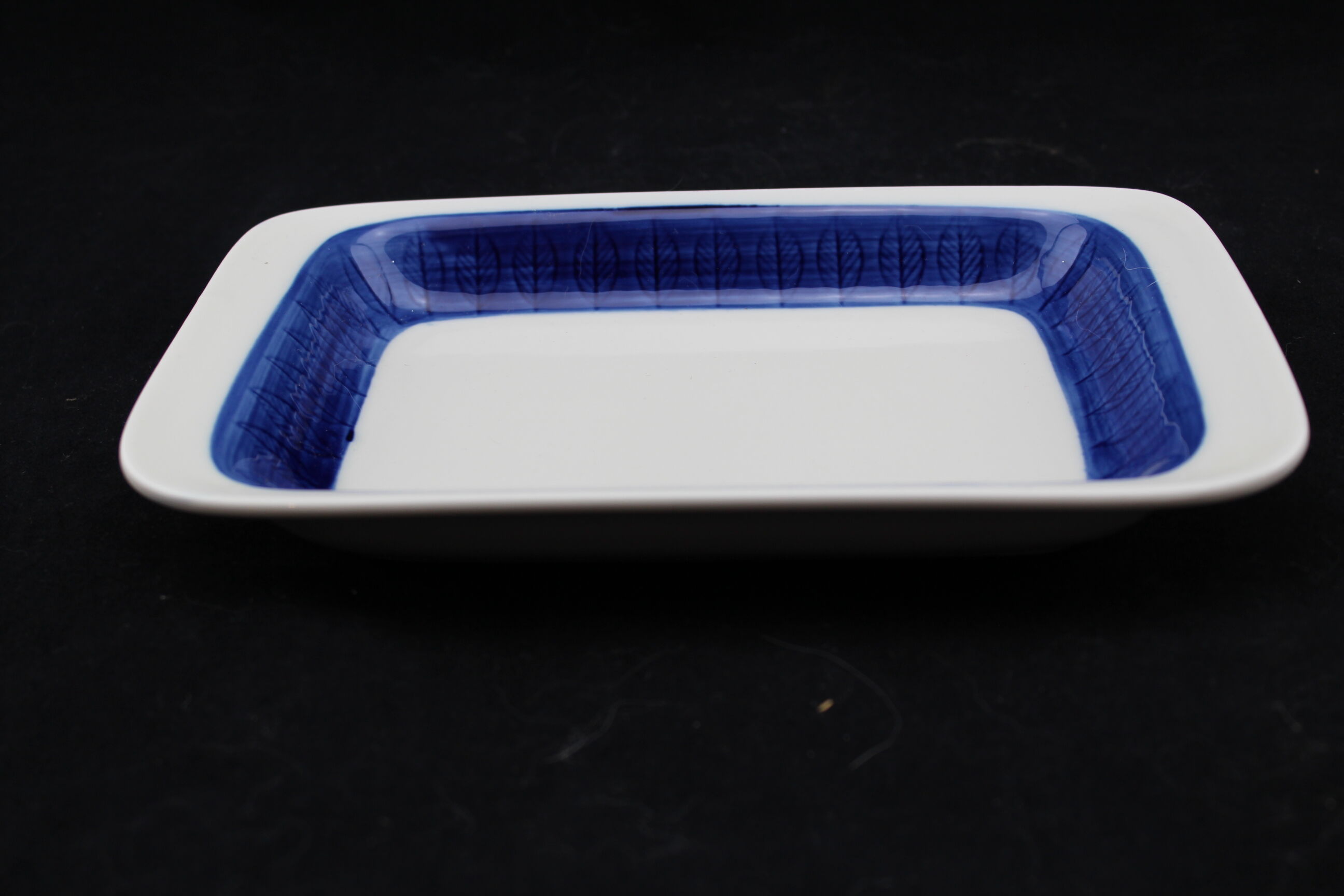 Empty Pocket Koka by Rörstrand, fish, blue