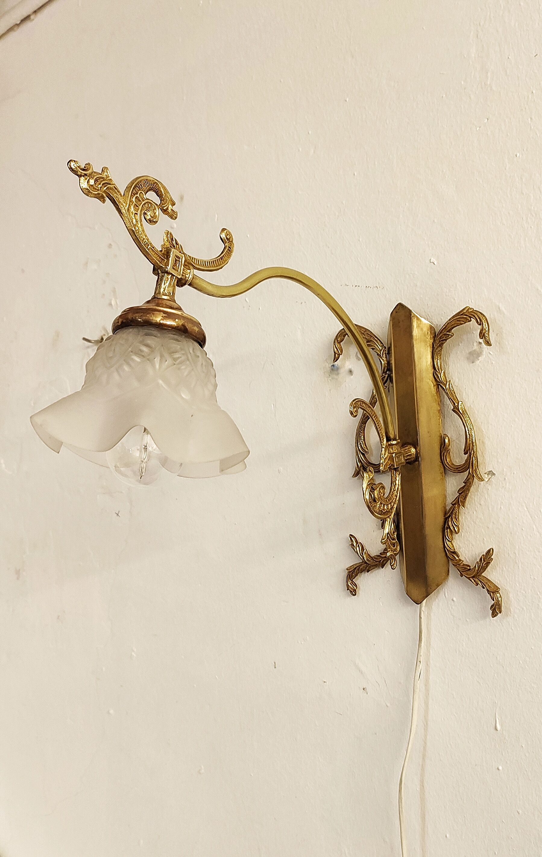 Bronze Modernist wall lamp. Spain, 1930s.
