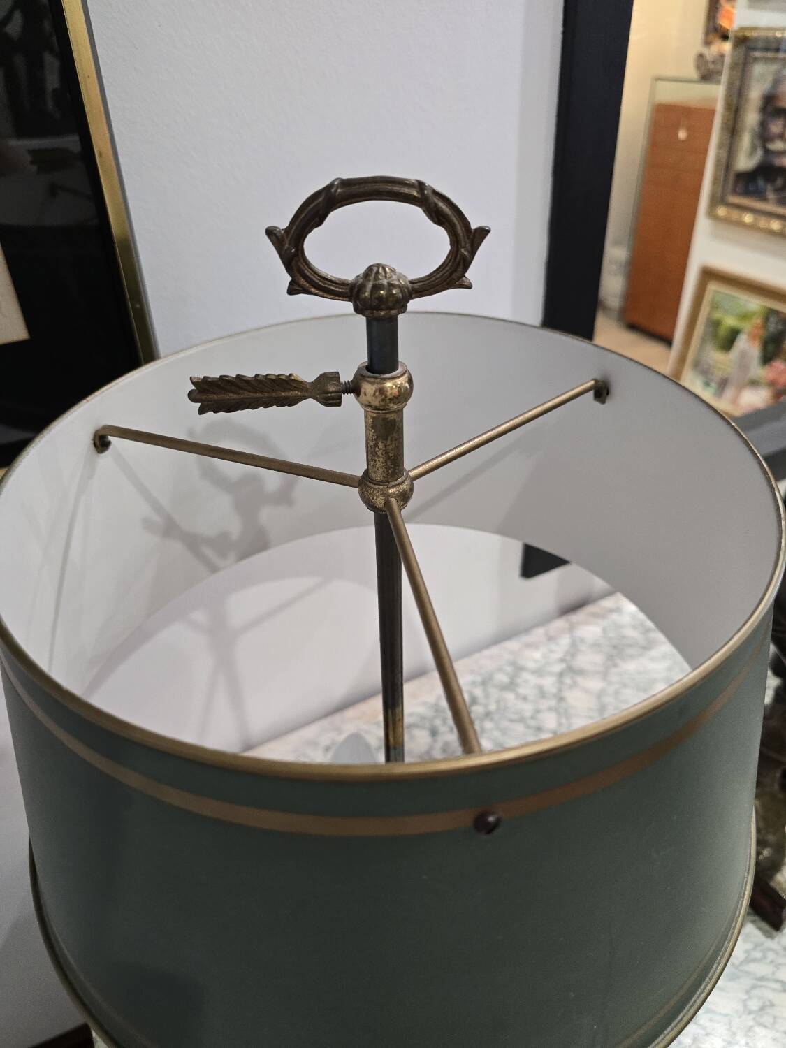 Three-armed brass hot water bottle lamp with empire green shade