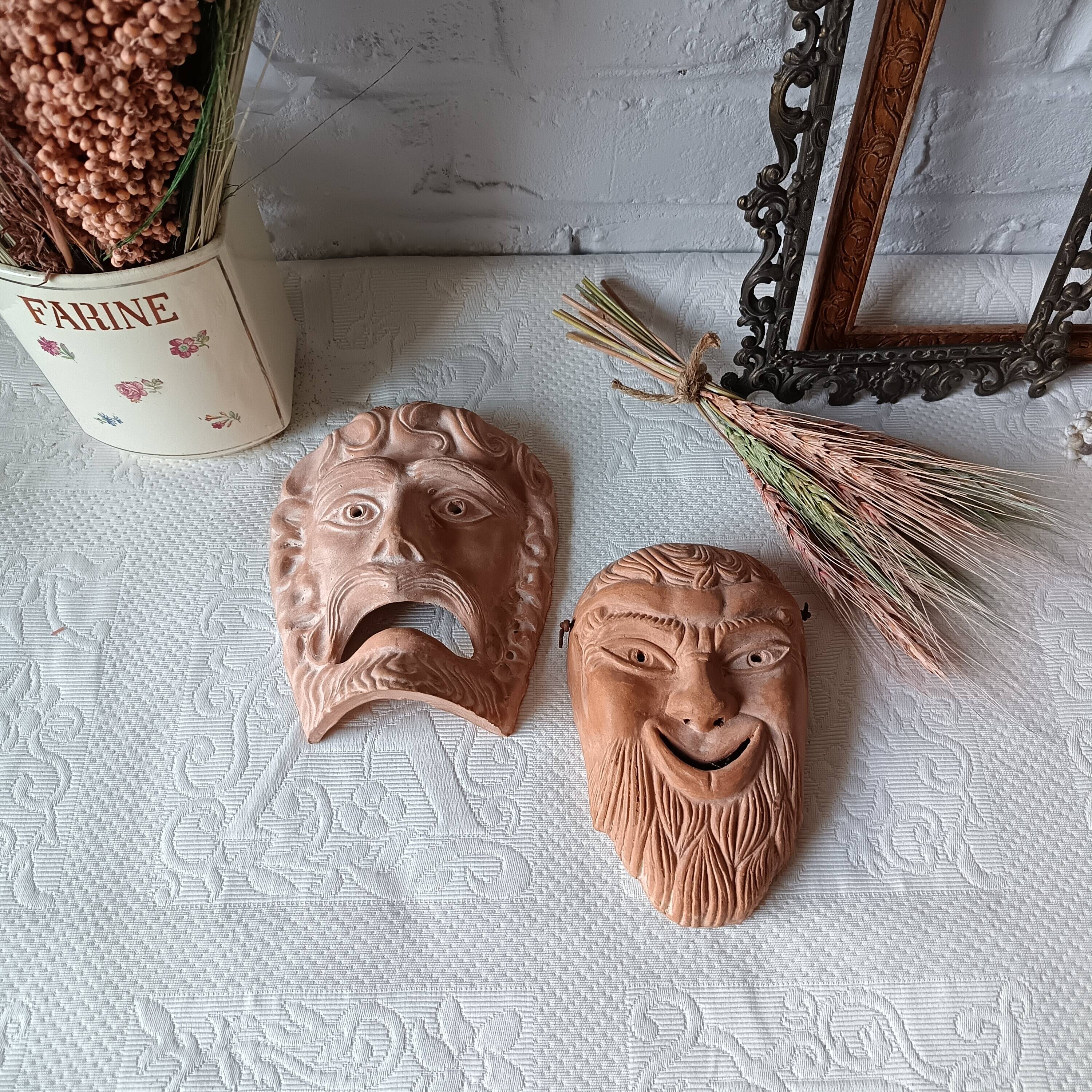 2 vintage terracotta masks made in Greece