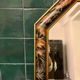 Vintage beveled mirror with floral frame