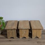 Trio of handcrafted blond wood stools