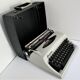 Writers' typewriters of light grey 70s Adler made in Holland