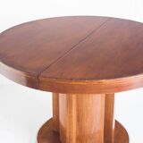 Table à manger avec une rallonge centrale. Vintage. Style Art Déco. Bois vernis. France, années 60.