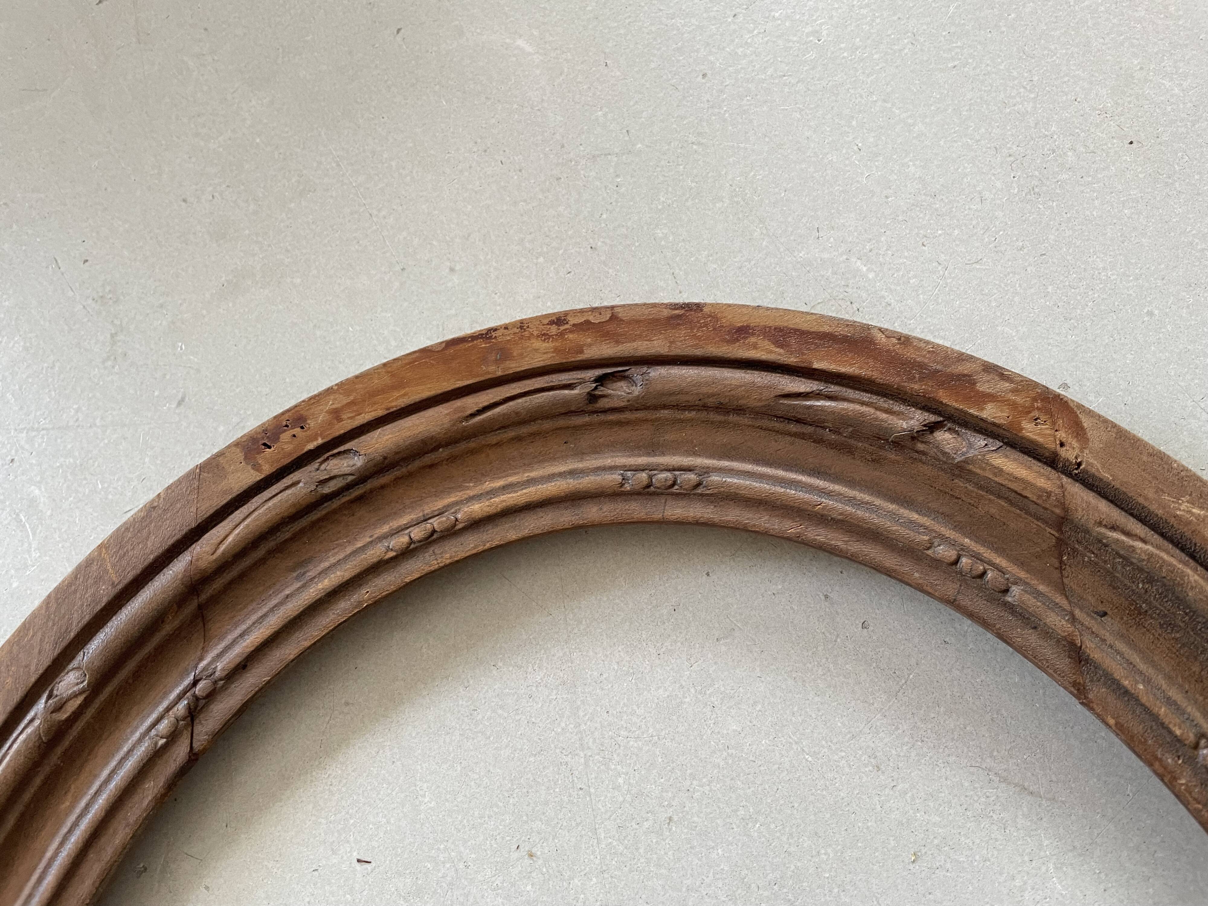 Oval old wooden frame