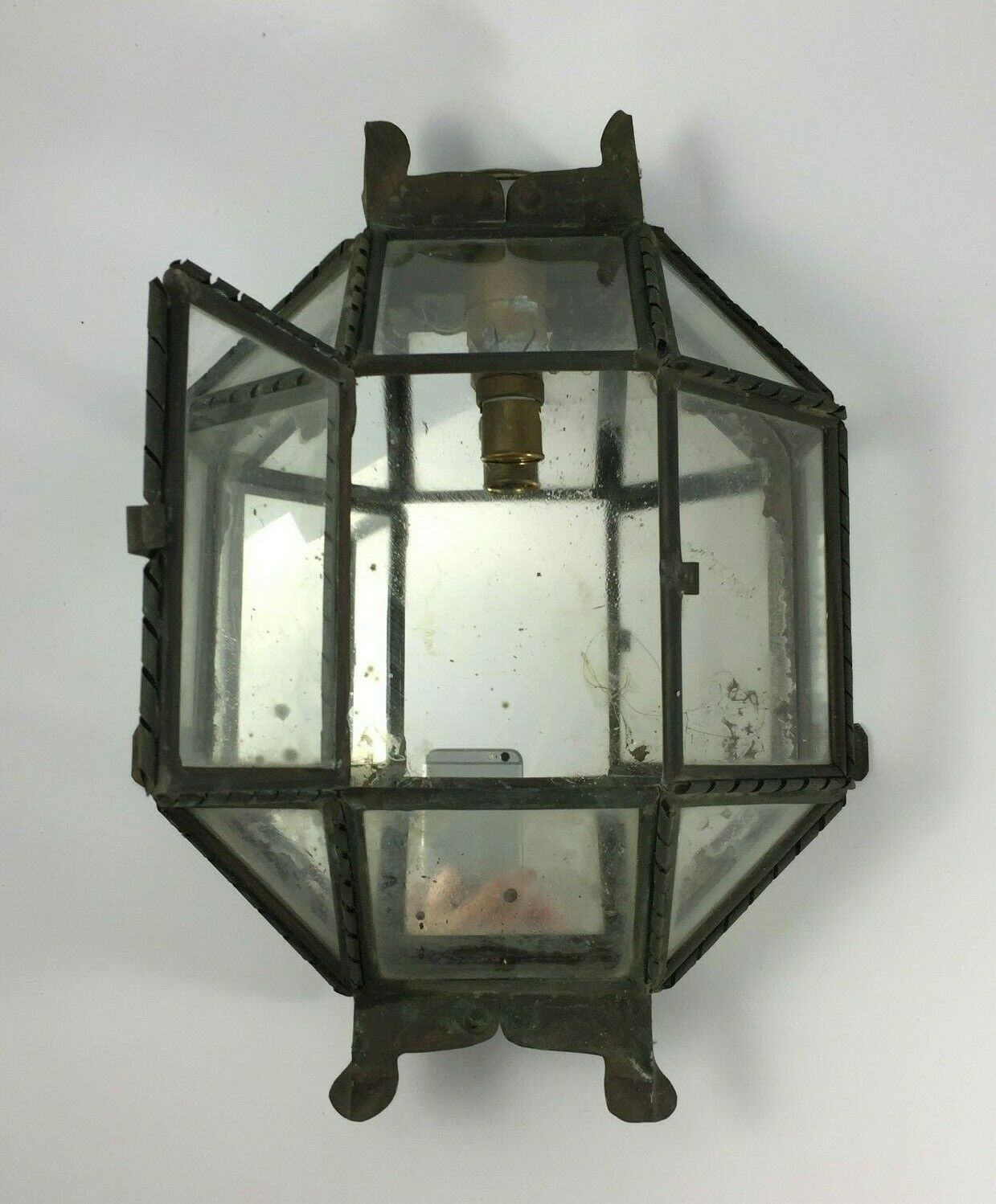 Metal and brass wall light with mirror background 1900