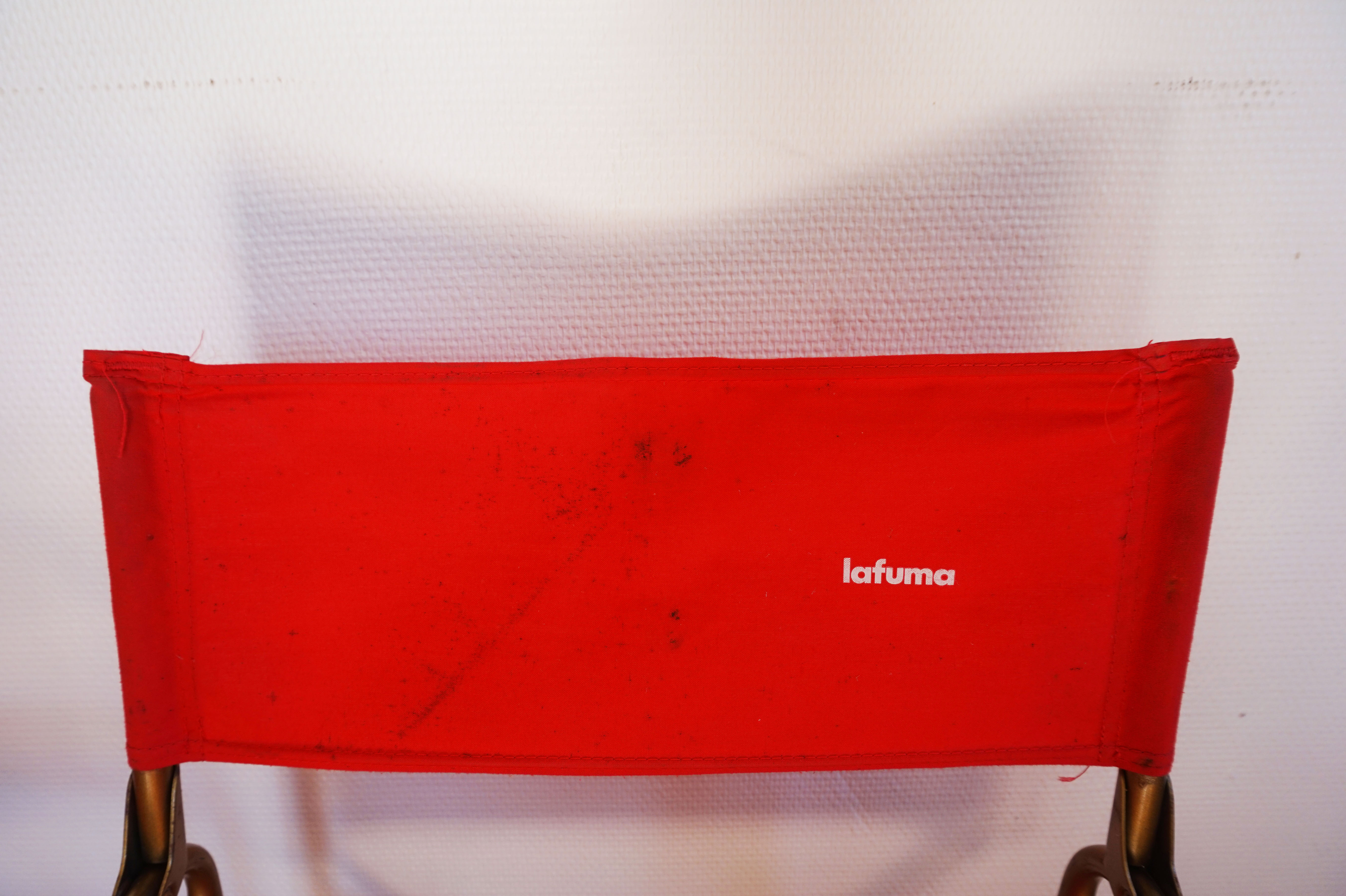 Red vintage pair of lafuma folding chairs