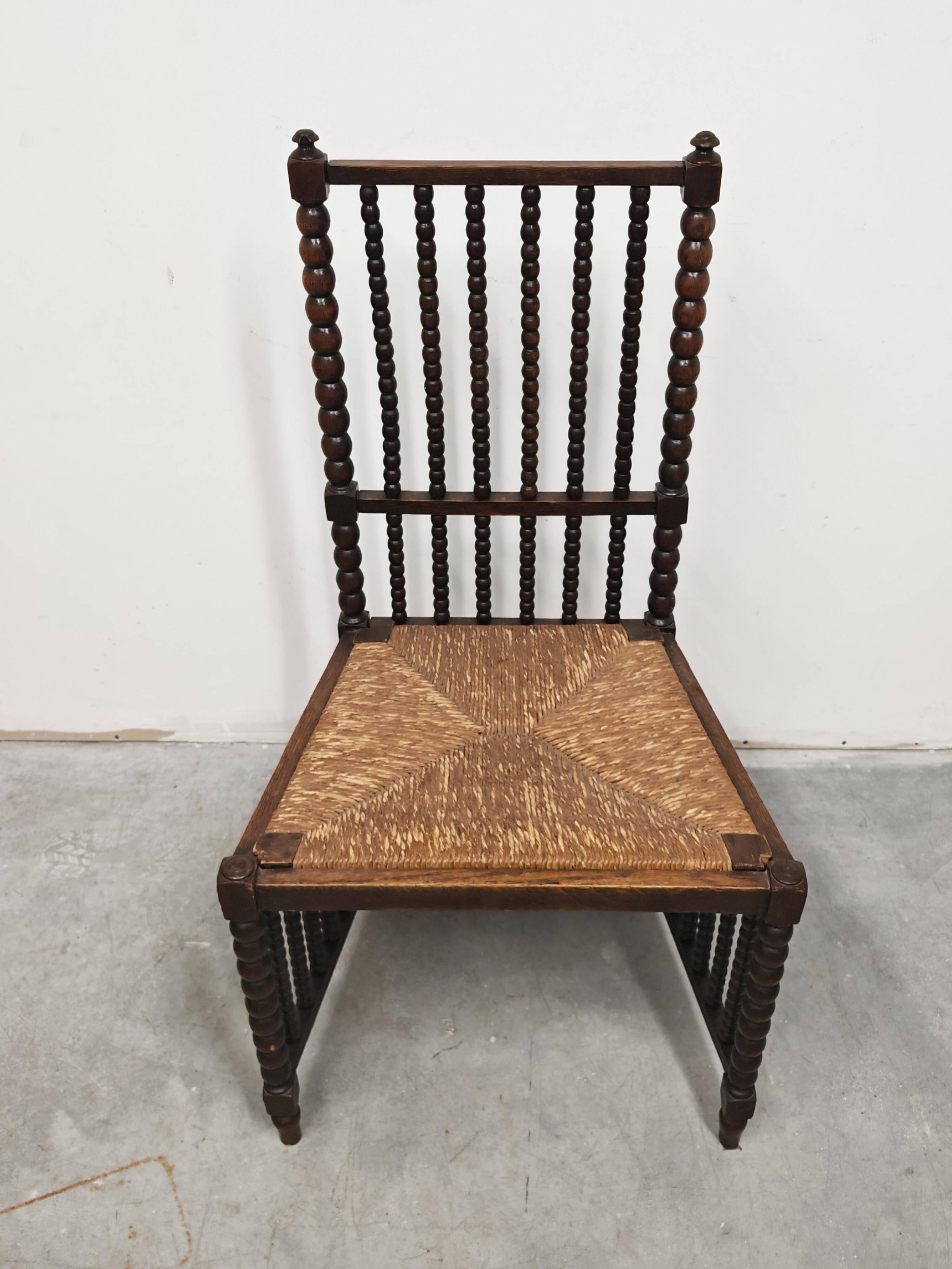 Antique High Back Bobbin Chair in Oak with Straw Seat, 1900s