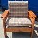 Brutalist-style bench and armchairs in 1970s pine.