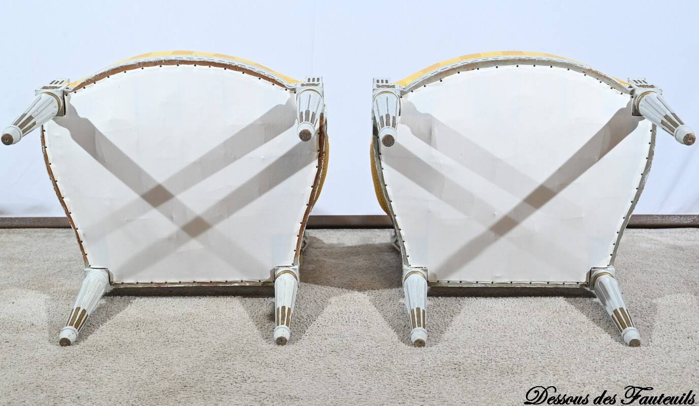 Pair of Cabriolet Armchairs, in rechampi wood, Louis XVI style – Late 19th century