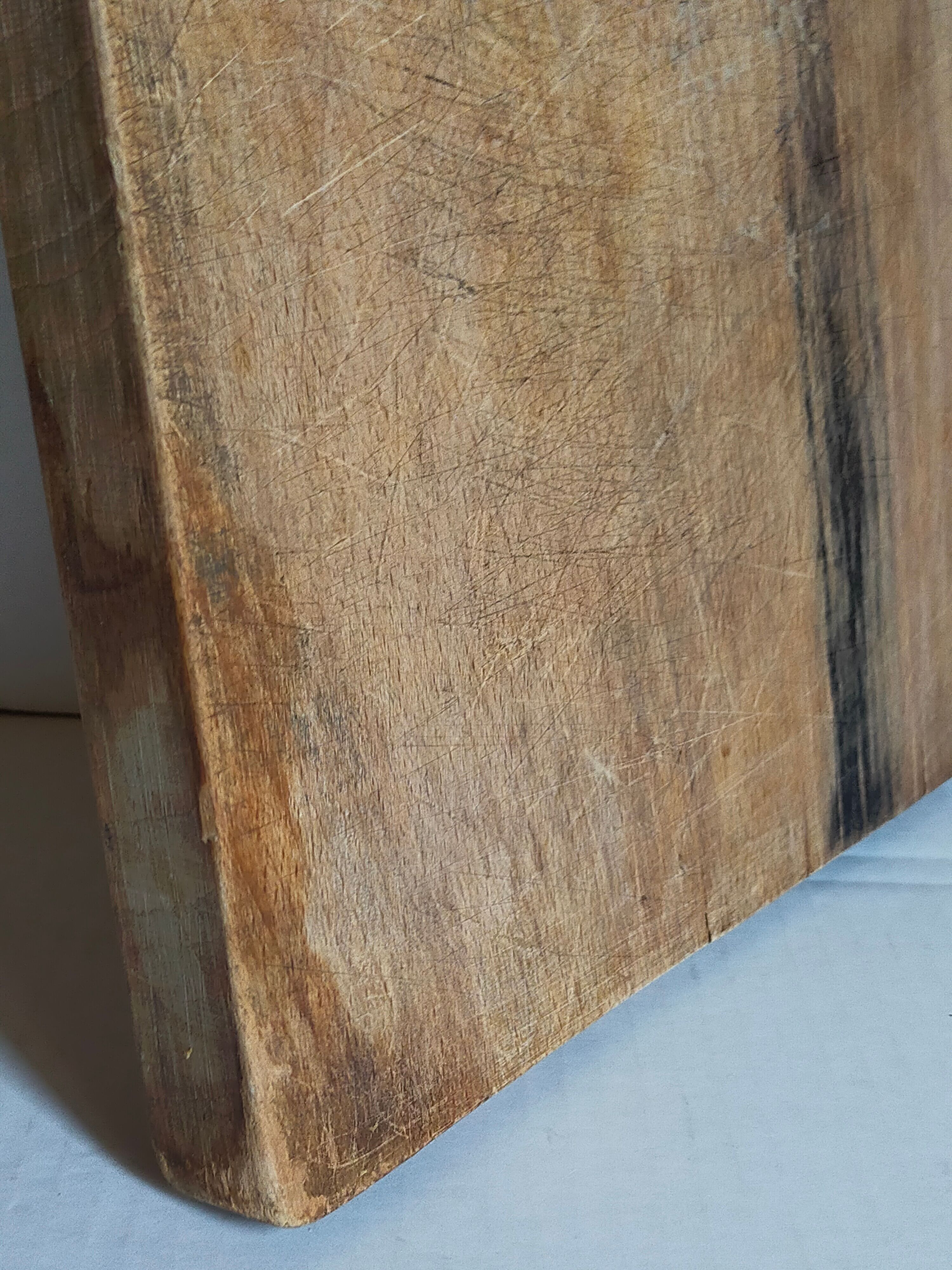 Cutting board in old solid wood