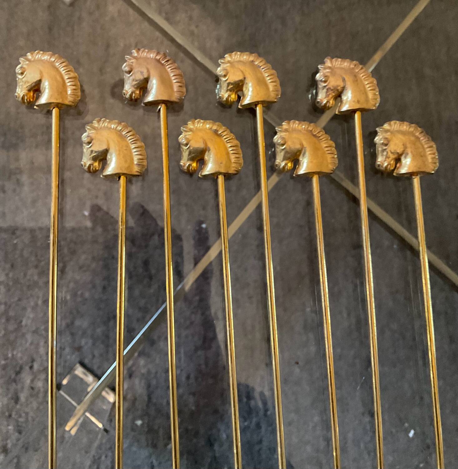 Series of 8 vintage golden spoons