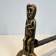 Pair of bronze andirons with seated shamans monogrammed Anton Prinner