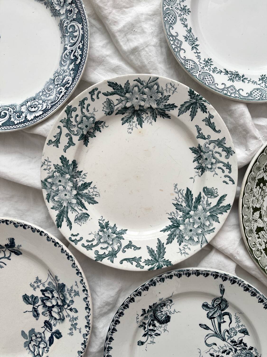 6 mismatched Saint Amand ironware dessert plates